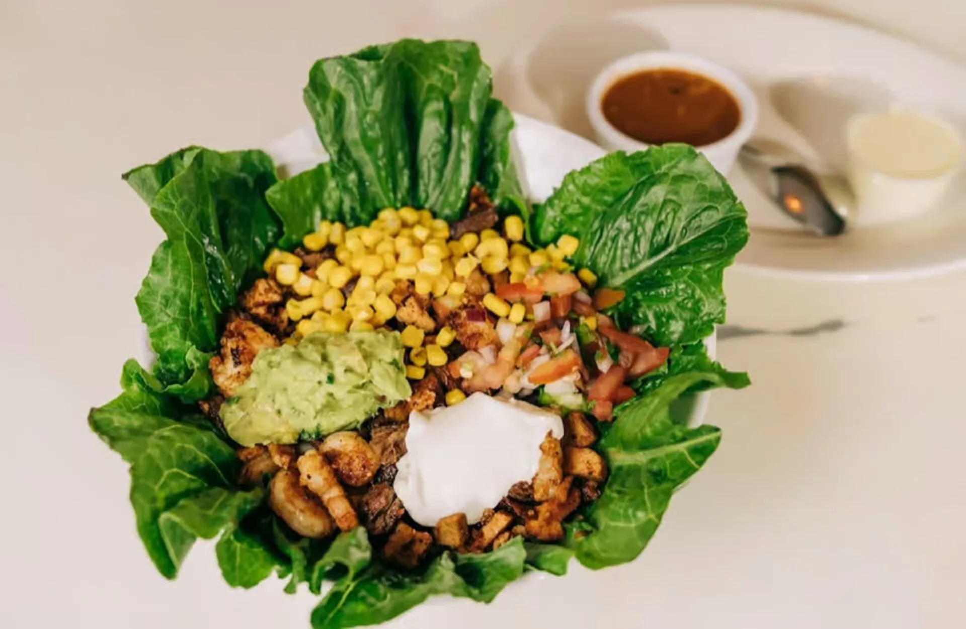 Loco Bowl - A loaded bowl with rice, beans, your choice of protein, and all the toppings